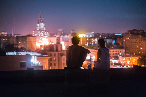 A couple admiring Rome's night landscape