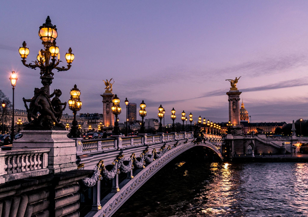 Night photo of Pont Alexandre III bridge in Paris, France