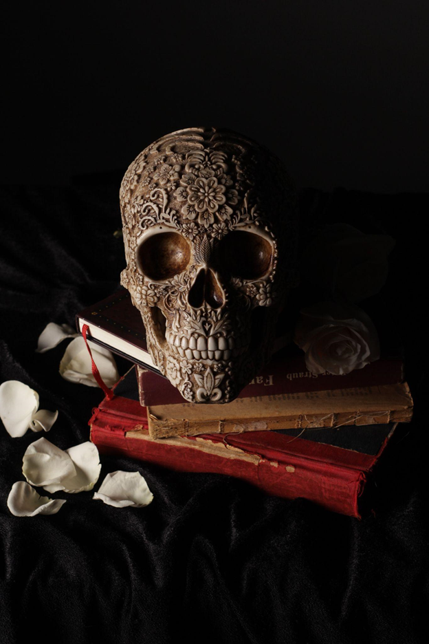 A skull placed on a spell book