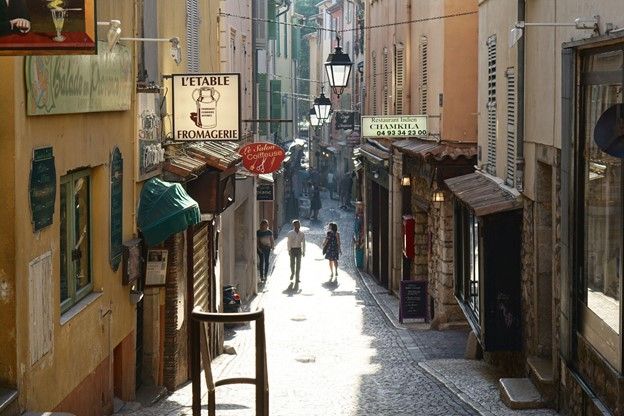 A photo of a French town at which one can practice basic French phrases