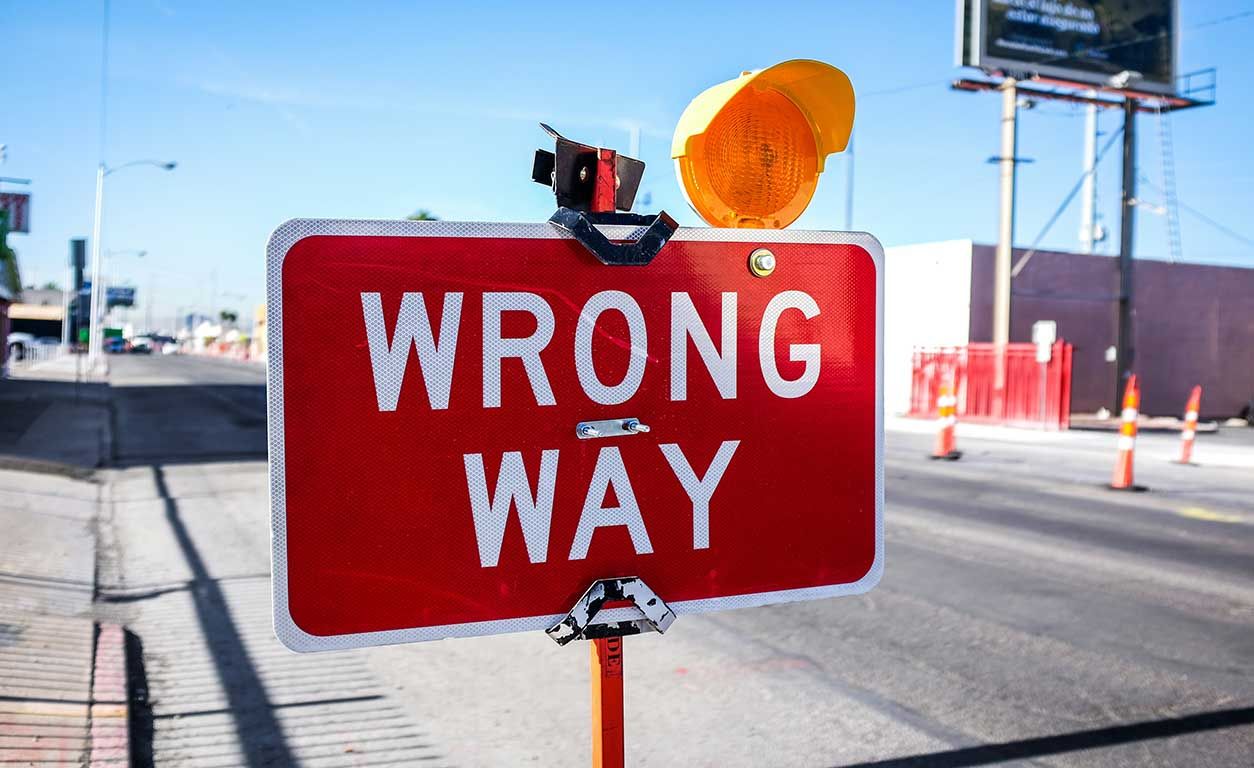 Red road sign-Wrong way