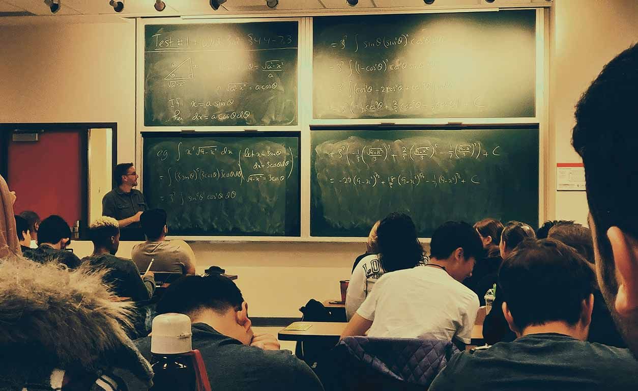 Math teacher teaches in the classroom